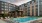 a pool in front of a building