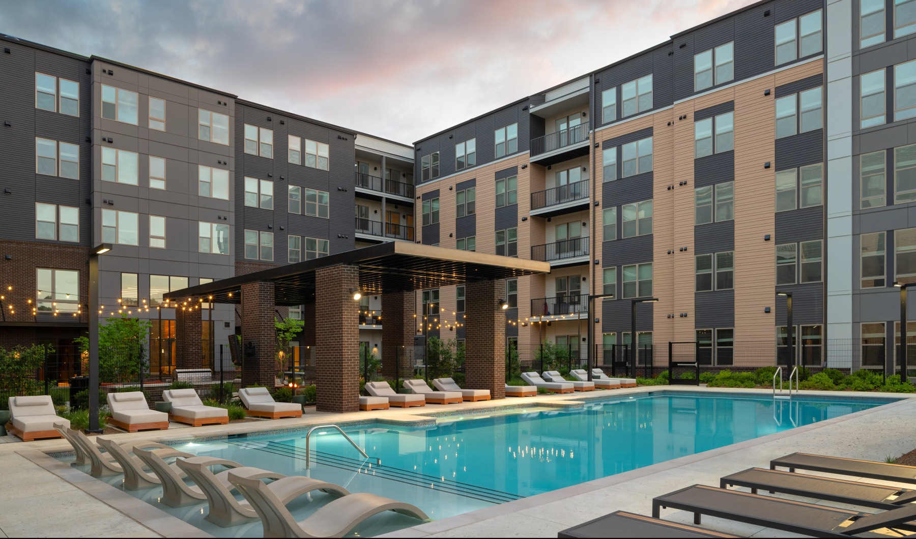 a pool in front of a building