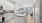 a kitchen with white cabinets